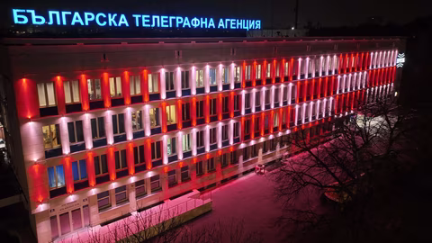 Фасадата на БТА светна в бяло и червено по случай Баба Марта